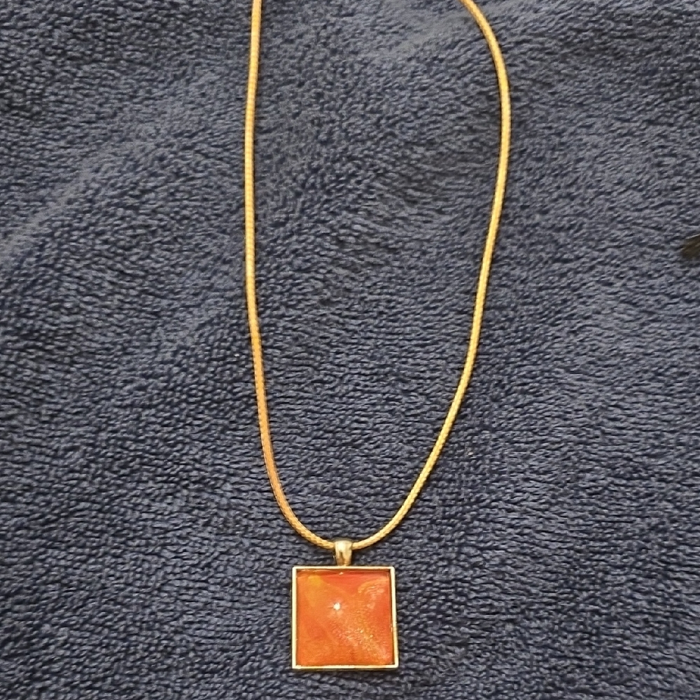 Elegant Gold and Orange Resin Pendant Necklace